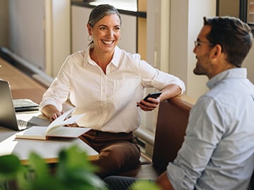 Businesswoman and man in meeting at office